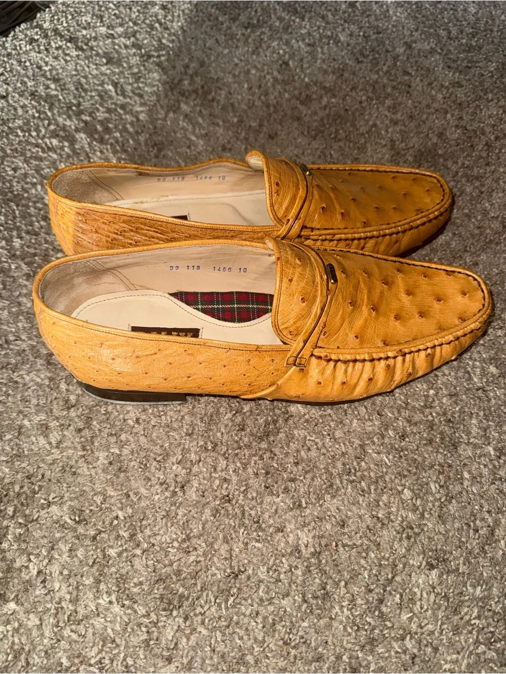 Bally of Switzerland genuine ostrich leather dress loafers.